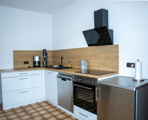 Die Küche unserer Ferienwohnung "Kreuzeck" im Ferienhaus Wetterstein im wunderschönen Grainau direkt an der Zugspitze